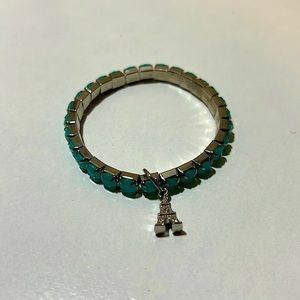 Women’s/kids blue gem bracelet with Eiffel Tower charm! Bracelet can stretch!
